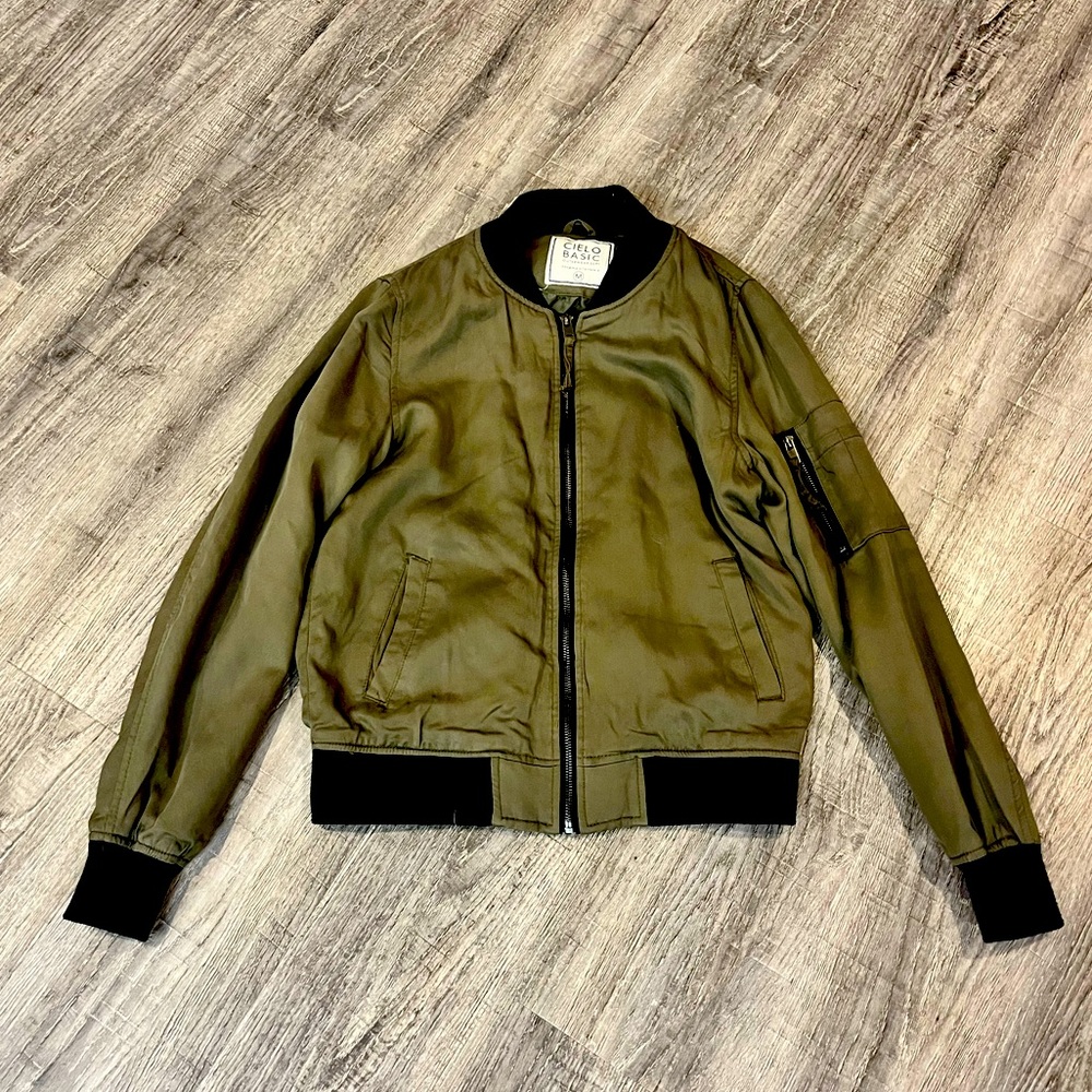 Olive green and black bomber jacket.